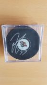 American Ice Hockey Defender Jordan Leopold Signed Official NHL Puck. Signed in silver ink. Housed