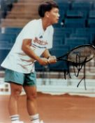 Tennis Michael Chang Signed 10x8 inch Colour Photo. Signed in black ink. Good condition. All
