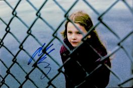 Abigail Breslin Signed 12x8 inch Colour Photo. Signed in blue ink. Picture is as a child. Good