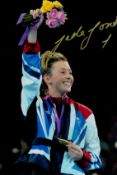 Olympics Jade Jones signed 12x8 colour photo pictured with her gold medal at the London 2012