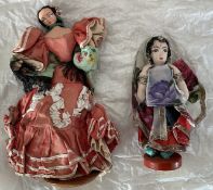2 x Collectors Dolls, a pair of dolls both have wooden stands good conditionWe combine postage on