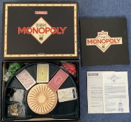 Monopoly Deluxe Edition (UK Edition) by Waddingtons appears complete and in its original
