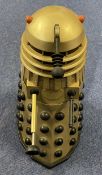 Dalek Model by Amerang over 12 inches tall Gold in colour and made of Plastic good conditionWe