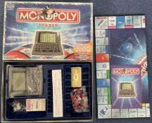 Monopoly Trader by Parker Brothers / Hasbro Inc 2001, appears complete with internal contents