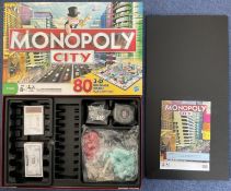 Monopoly City with 80 3D Buildings by Hasbro 2008, unused complete and internal contents still in