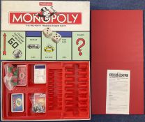 Monopoly The Property Trading Board Game (UK Edition) by Waddingtons / Tonka 1996, appears to be
