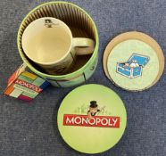 Monopoly Mug and Coaster by Hasbro 2010, unused and complete with Monopoly Tin good conditionWe