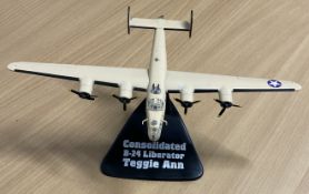 Consolidated B-24 Liberator Teggie Ann Die-Cast Model with Stand in good conditionWe combine postage
