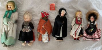 6 x Collectors Dolls, a group of six dolls with various construction the doll wearing clogs has eyes