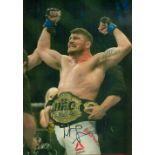 Former UFC Fighter Michael Bisping Signed 12x8 inch Colour UFC Photo. Signed in black ink. Good
