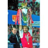 Tony Adams signed 12x8 colour photo with premiership trophy. Good condition. All autographs come