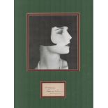 Louise Brooks (1906-1985) Actress Signed Vintage Page With 11x16 Mounted Photo. Good condition.