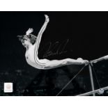Autographed NADIA COMANECI 1976 20 x 16 Limited Edition : B/W, depicting an iconic image showing
