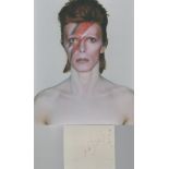 David Bowie (1947-2016) Singer Signed Vintage Page Plus 8x10 Aladdin Sane Photo. Good condition. All