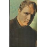 Marlon Brando signed 8x6 colour photo dedicated. Good condition. All autographs come with a