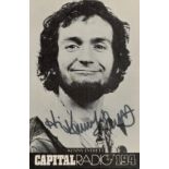 Kenny Everett - a signed black and white Capital Radio promotional postcard accompanied by two books