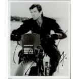 Pierce Brosnan signed 10x8 black and white photograph in character as James Bond, dated 1997All