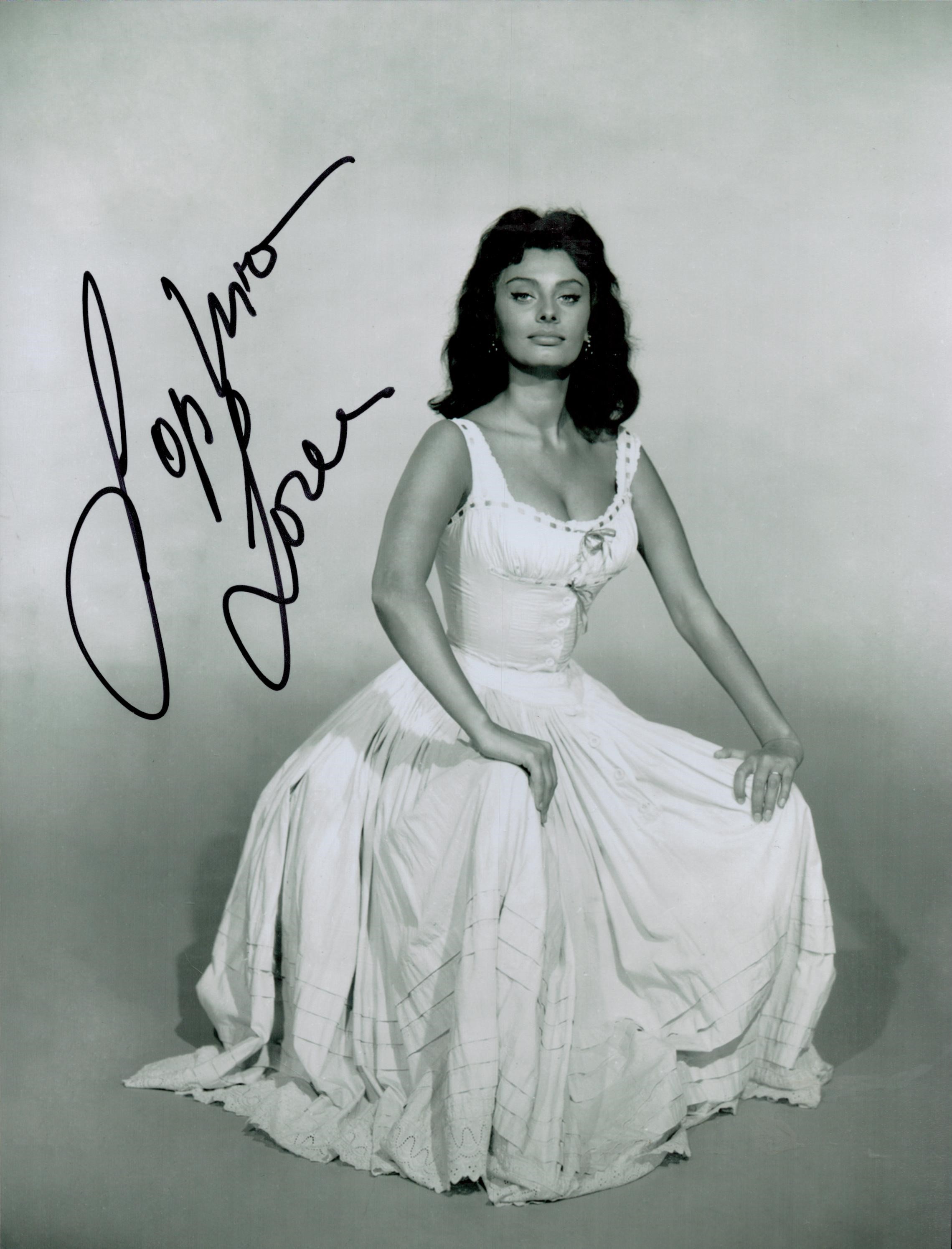 Sophia Loren signed 10x8 black and white photo. Loren is an Italian actress. She was named by the