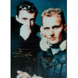Eddie Irvine and Johnny Herbert signed 12x8 colour photo. Good condition. All autographed items come