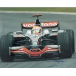 Lewis Hamilton signed McLaren Formula One 10x8 colour photo. Sir Lewis Carl Davidson Hamilton MBE