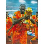 Football Kolo Toure Ivory Coast signed 12x8 colour photo. Kolo Abib Touré (born 19 March 1981) is an