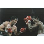 Boxing Gerry Cooney signed 12x8 colour photo pictured during his heavyweight title fight with