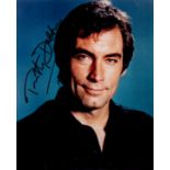 James Bond. Timothy Dalton Signed 10 x 8 inch Colour Portrait Photo. Signed in Black Ink. Good