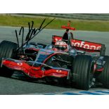 Heikki Kovalainen Formula One Driver Signed Mclaren Photo. Good condition. All autographs are