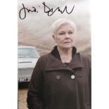 James Bond - Dame Judi Dench. P, C sized picture in character. Good condition. All autographs are