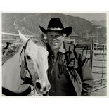 Howard Keel signed 10x8 inches black and white photo. Good condition. All autographs are genuine