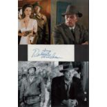 Robert Mitchum 12x8 mounted signature piece includes signed white card and four superb photos