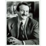 Robin Williams (1951 2014), a signed 10x8 photo. An American actor and comedian, he is regarded as