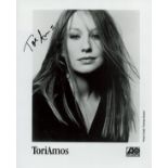 Tori Amos signed 10x8 inch black and white promo photo. Good condition. All autographs are genuine