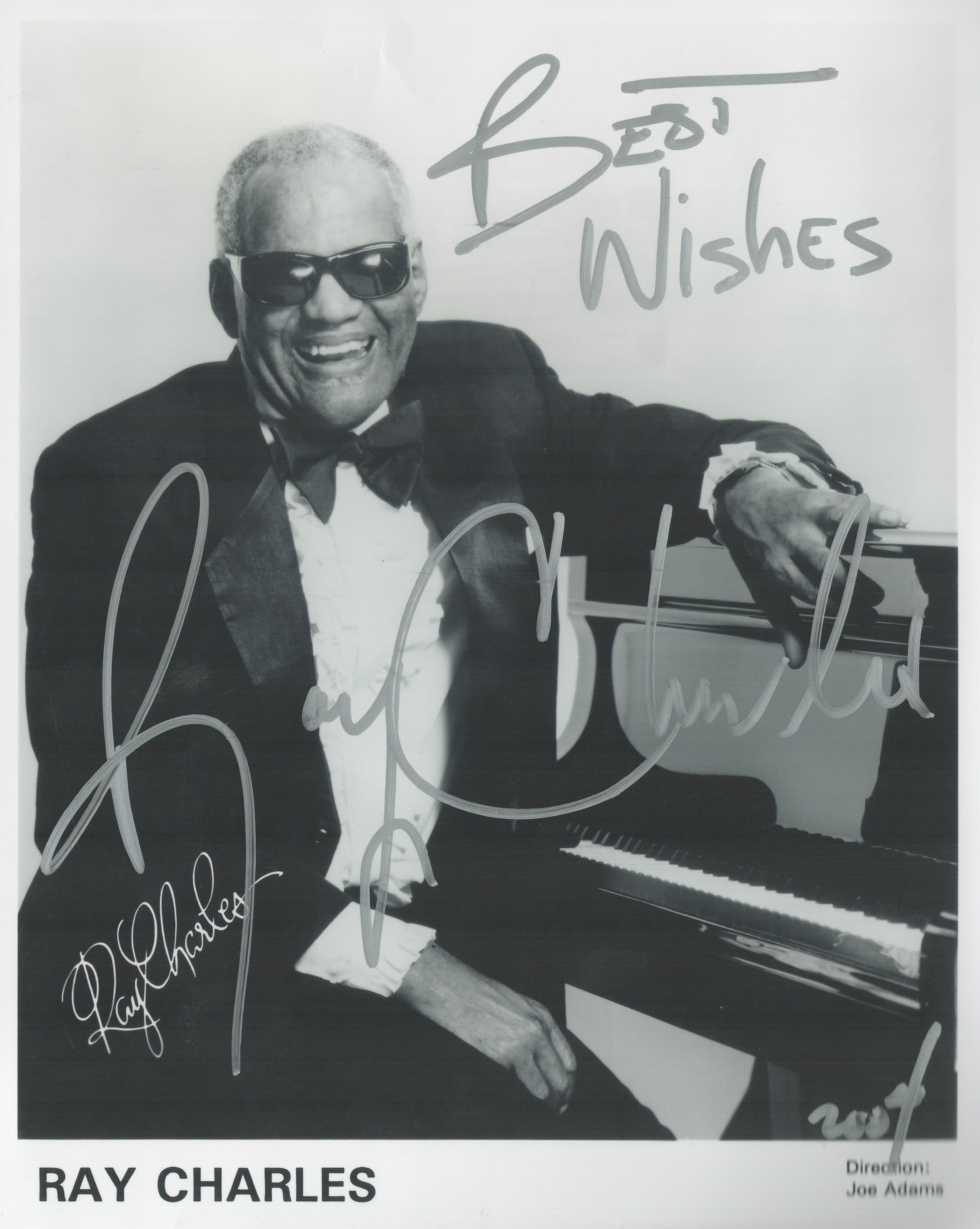 Ray Charles signed 10x8 inch black and white promo photo. Good condition. All autographs are genuine