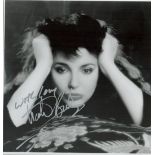 Kate Bush signed 7x7 inch black and white photo. Good condition. All autographs are genuine hand