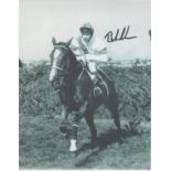Bob Champion signed 10x8 inch black and white photo pictured riding the legendary Aldaniti in the