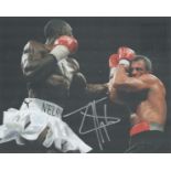 Boxing Star Johnny Nelson Signed 10x8 inch Colour In Action Photo. Good condition. All autographs