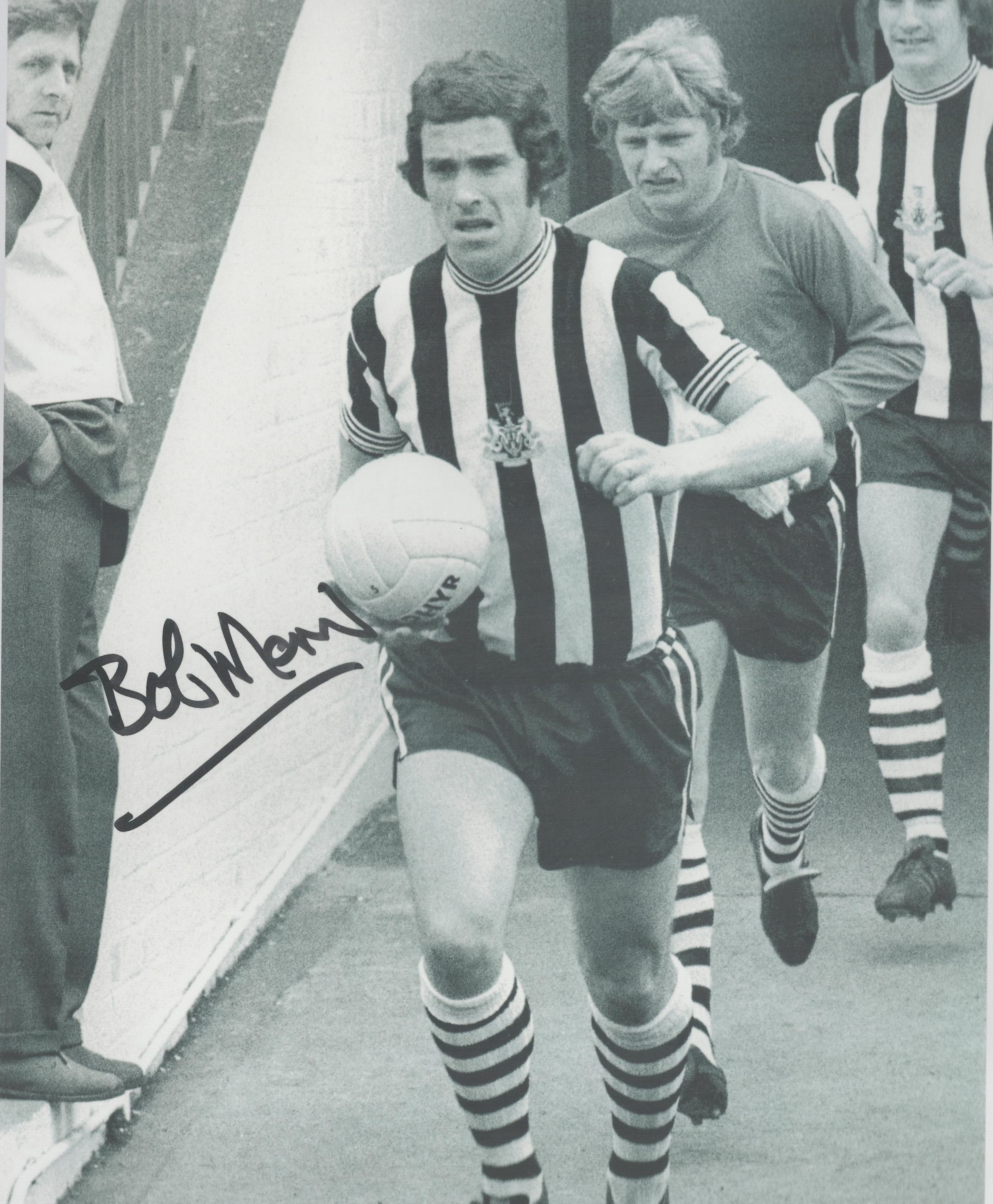 Bobby Moncur signed 10x8 inch black and white photo pictured leading Newcastle United out. Good