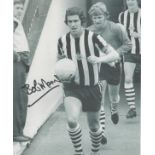 Bobby Moncur signed 10x8 inch black and white photo pictured leading Newcastle United out. Good