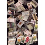Cigarette Cards. Collection of 250 plus assorted cigarette cards in a plastic bag. Includes Military