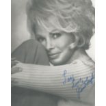 Janet Leigh signed 10x8 inch black and white photo. Good condition. All autographs are genuine