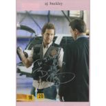 A. J. Buckley signed colour photo. Dedicated. An Irish Actor. On an A4 Pink Sheet. Good condition.