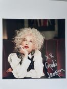Cyndi Lauper Chart Topping Singer 8x8 inch approx signed photo. Good condition. All autographs are