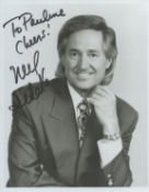 Neil Sedaka signed 10x8 inch vintage black and white photo dedicated. Good condition. All autographs