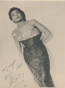 Shirley Bassey signed 9x7 inch original black and white photo dedicated. Good condition. All