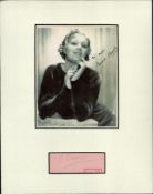 Mounted Signature of Binnie Barnes with black and white vintage photo. Mounted on Cream Card with