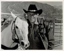 Howard Keel signed 10x8 inches black and white photo. Good condition. All autographs are genuine