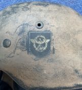 WW2 German Polizei Helmet with the wreathed eagle and swastika emblems, has its lining but no