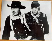 The Searchers John Wayne movie 8x10 photo signed by Patrick Wayne. He adopted his father's stage