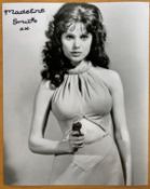 James Bond Madeline Smith signed busty Miss Caruso 10 x 8 b/w photo Live and Let Die. She is perhaps